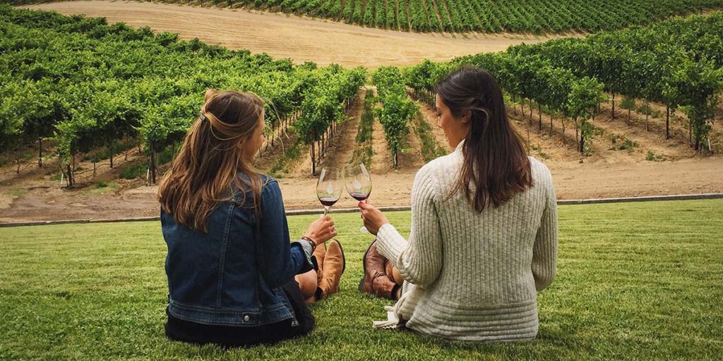 Women sampling Oregon Pinot Noir Wine