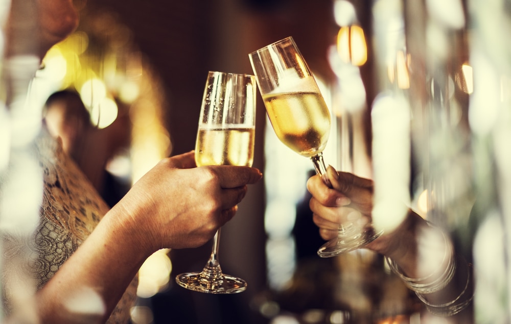 Willamette Valley Wineries, a happy couple toasting to the new year with sparkling wine flutes
